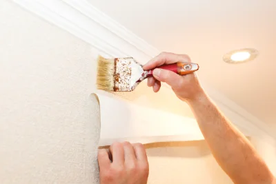Pose de papier peint à la Vèze — revêtements muraux et toiles de verre